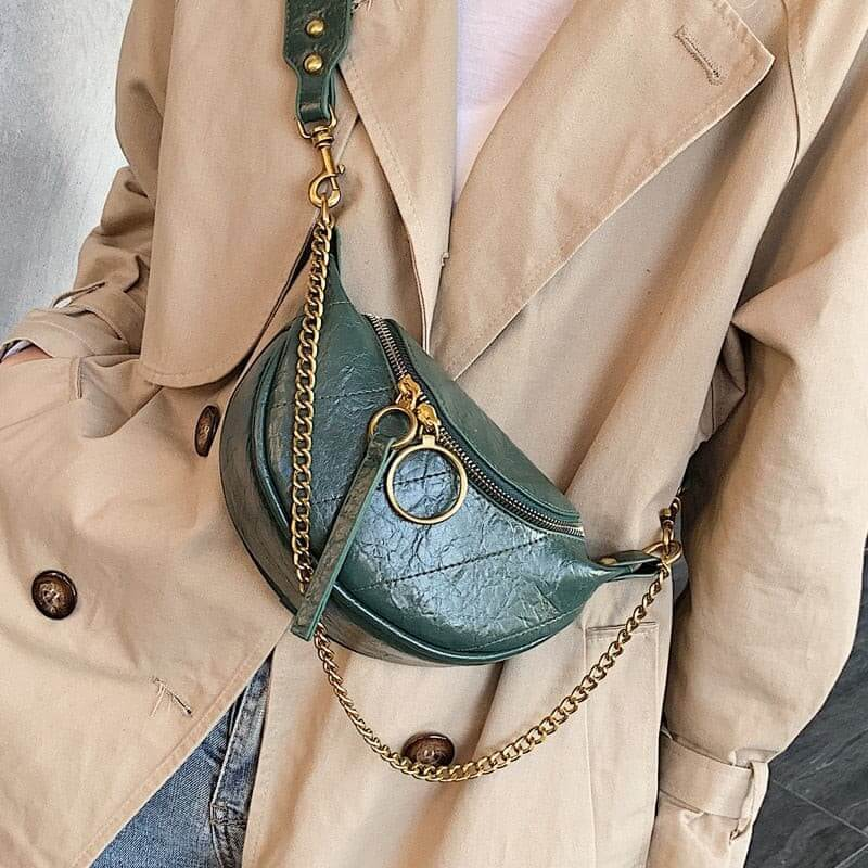 Model wearing leather chains crossbody bag