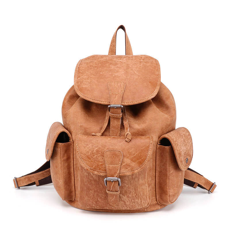 A brown leather backpack with a zipper closure, adjustable straps, and multiple compartments.