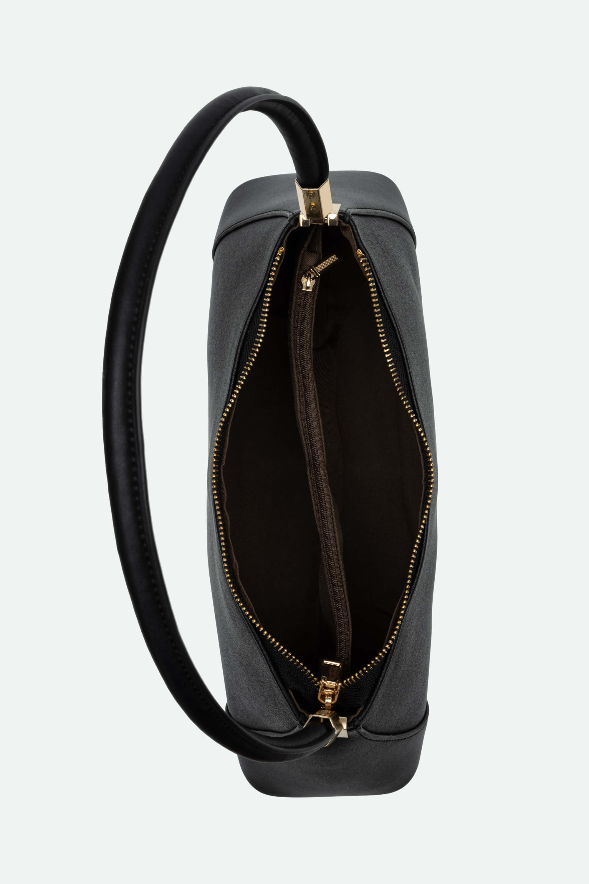 Black leather backpack with gold zipper on a white background