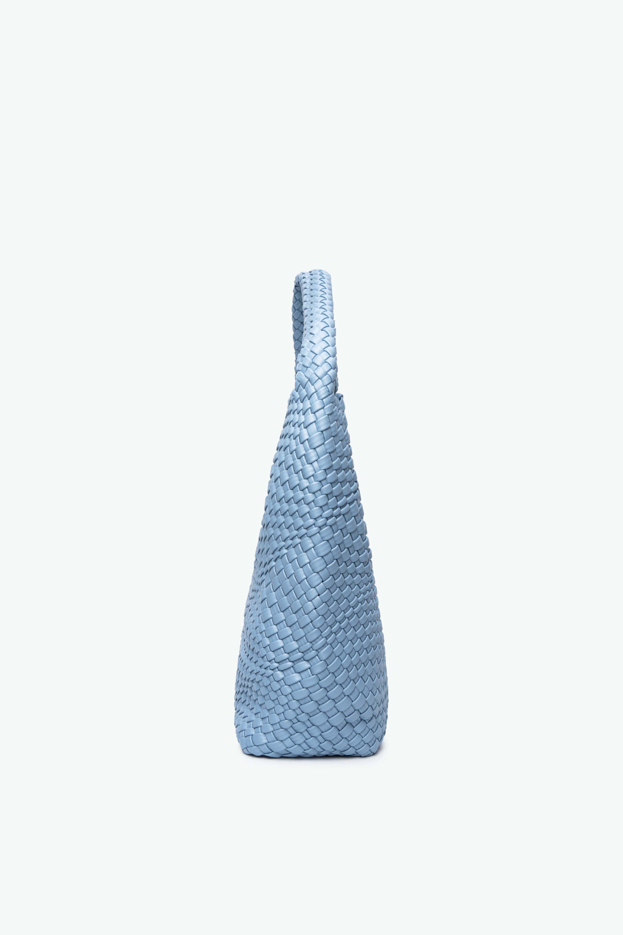 Blue textured handbag on a white background