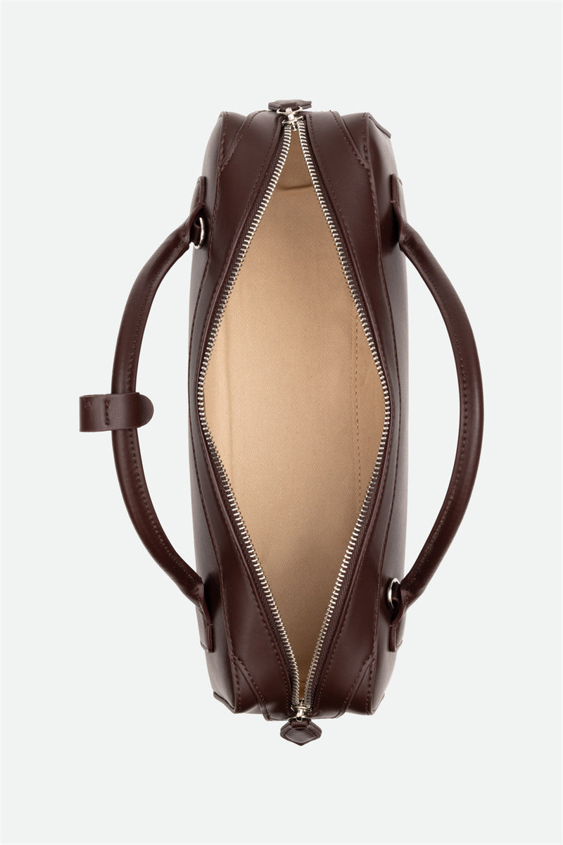 Brown leather bag with open front compartment on a white background