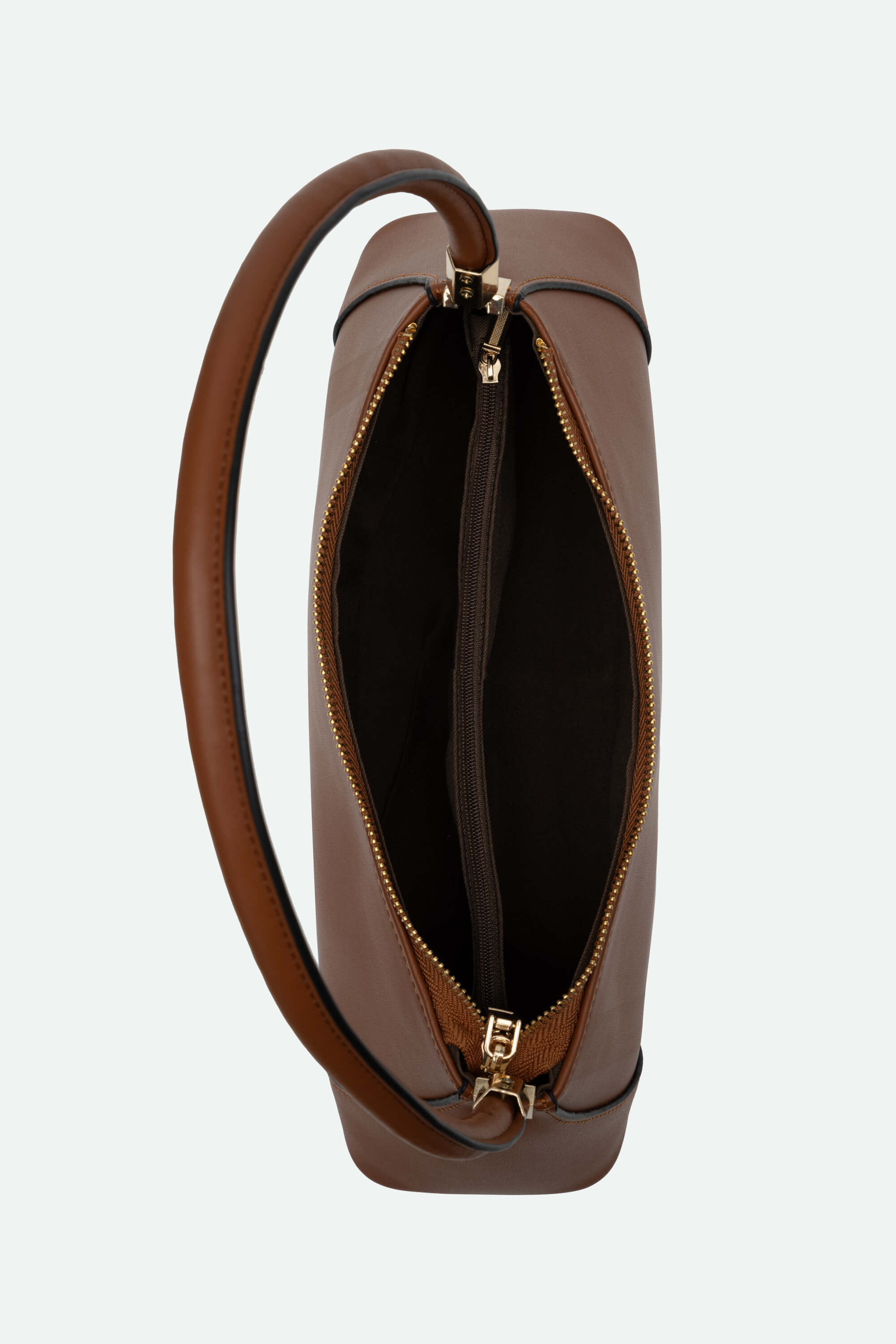 Brown leather handbag with a visible zipper on a white background