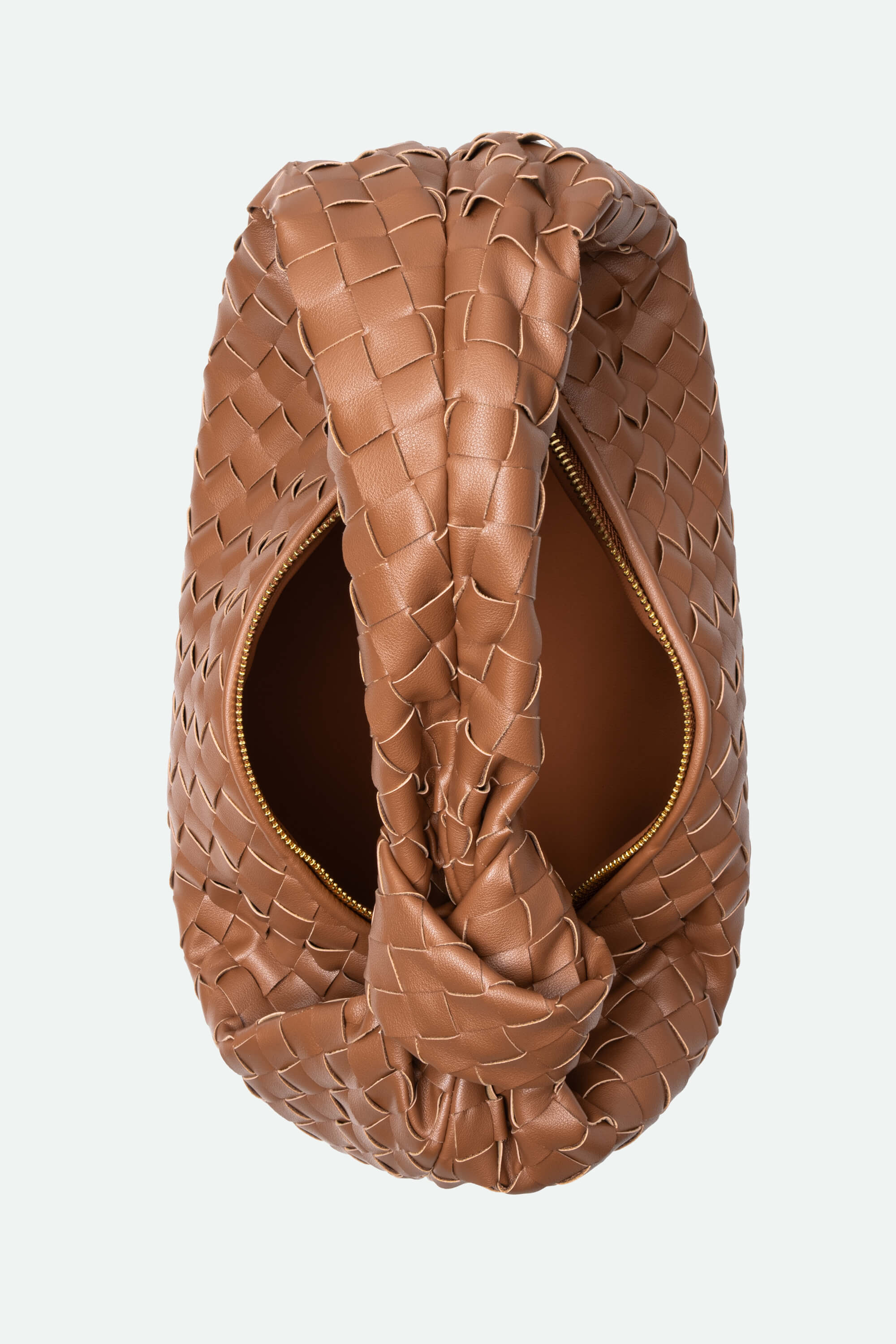 Brown woven handbag on a light gray background