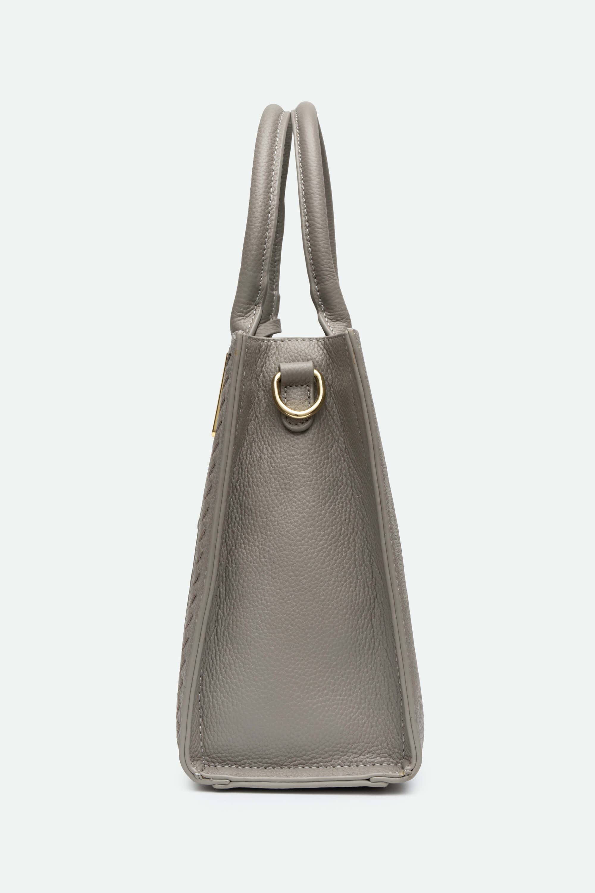 Gray handbag with a gold clasp on a white background