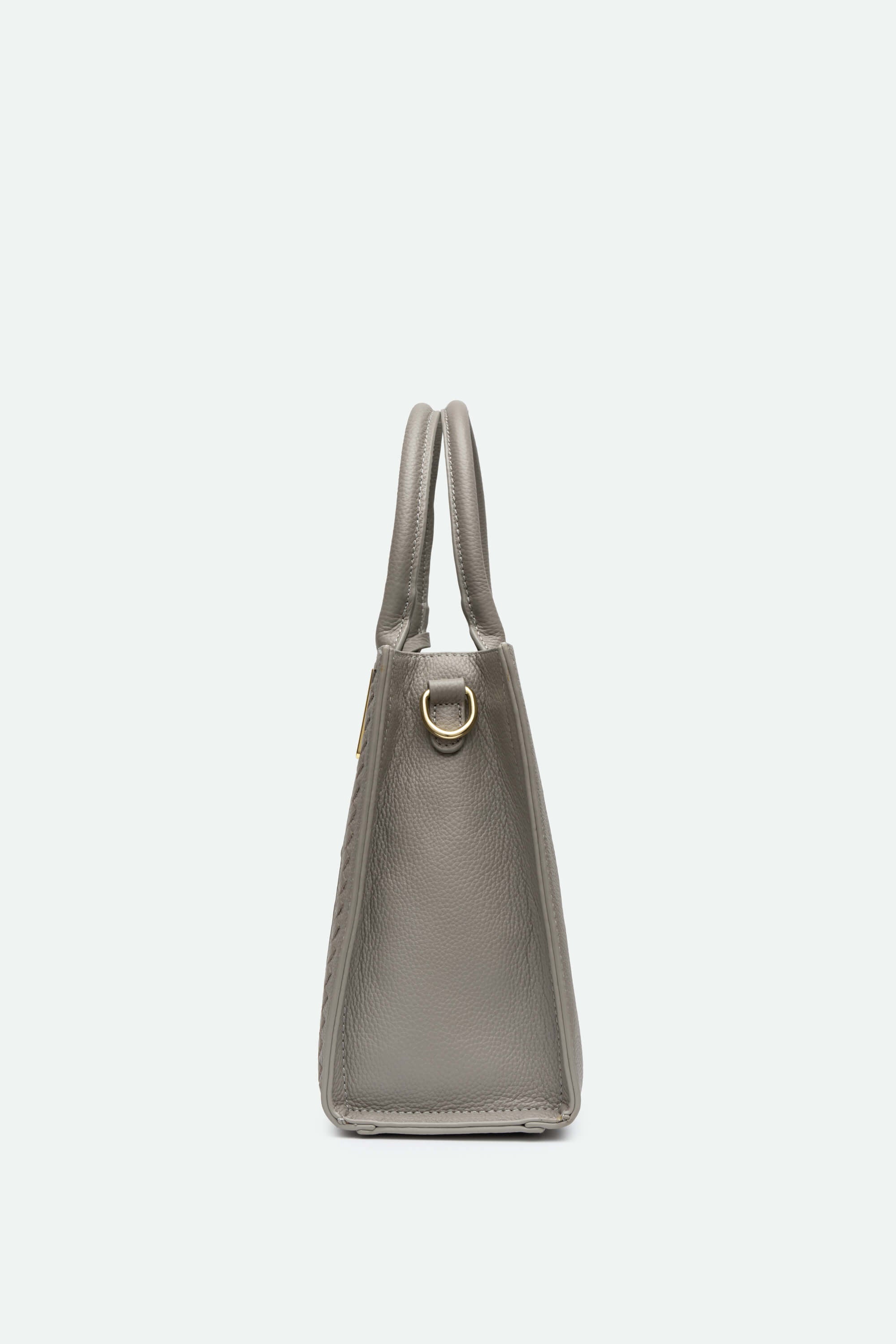Gray handbag with a gold clasp on a white background