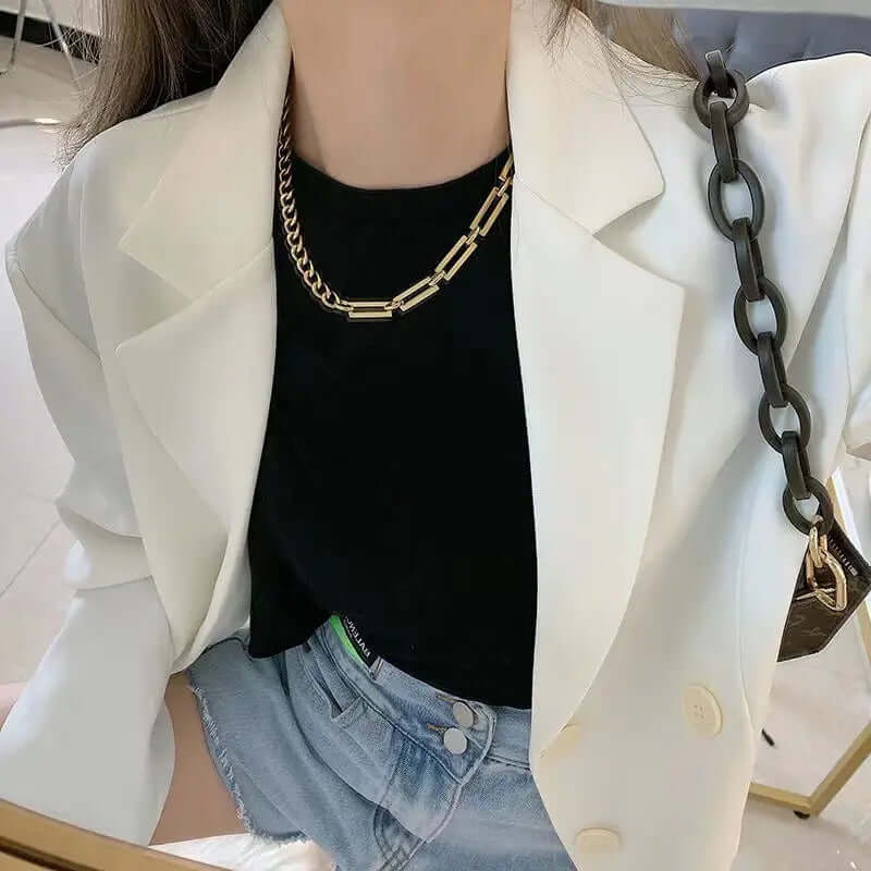 Woman wearing a Silver chain necklace