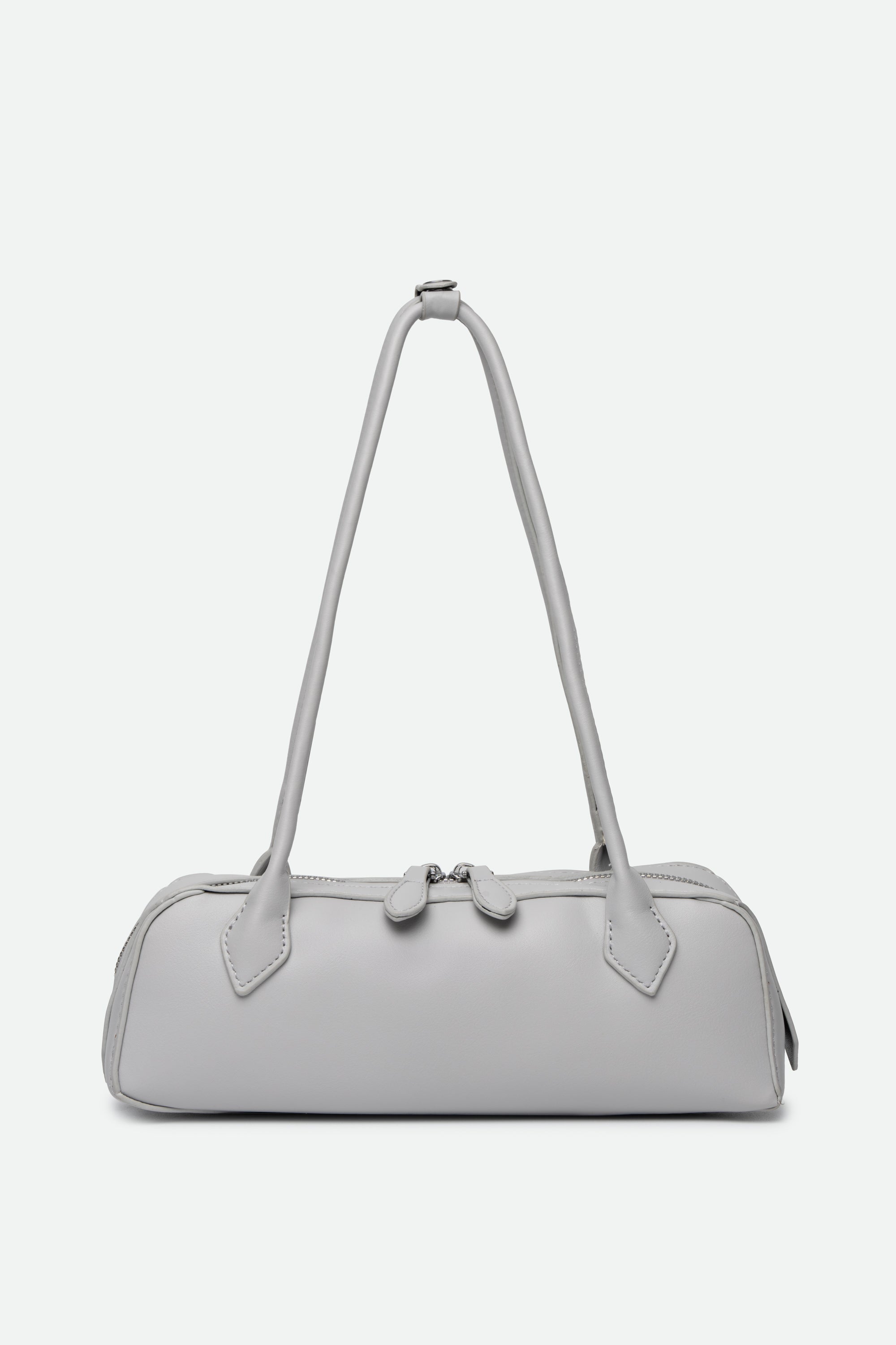 Light gray handbag with a strap on a white background