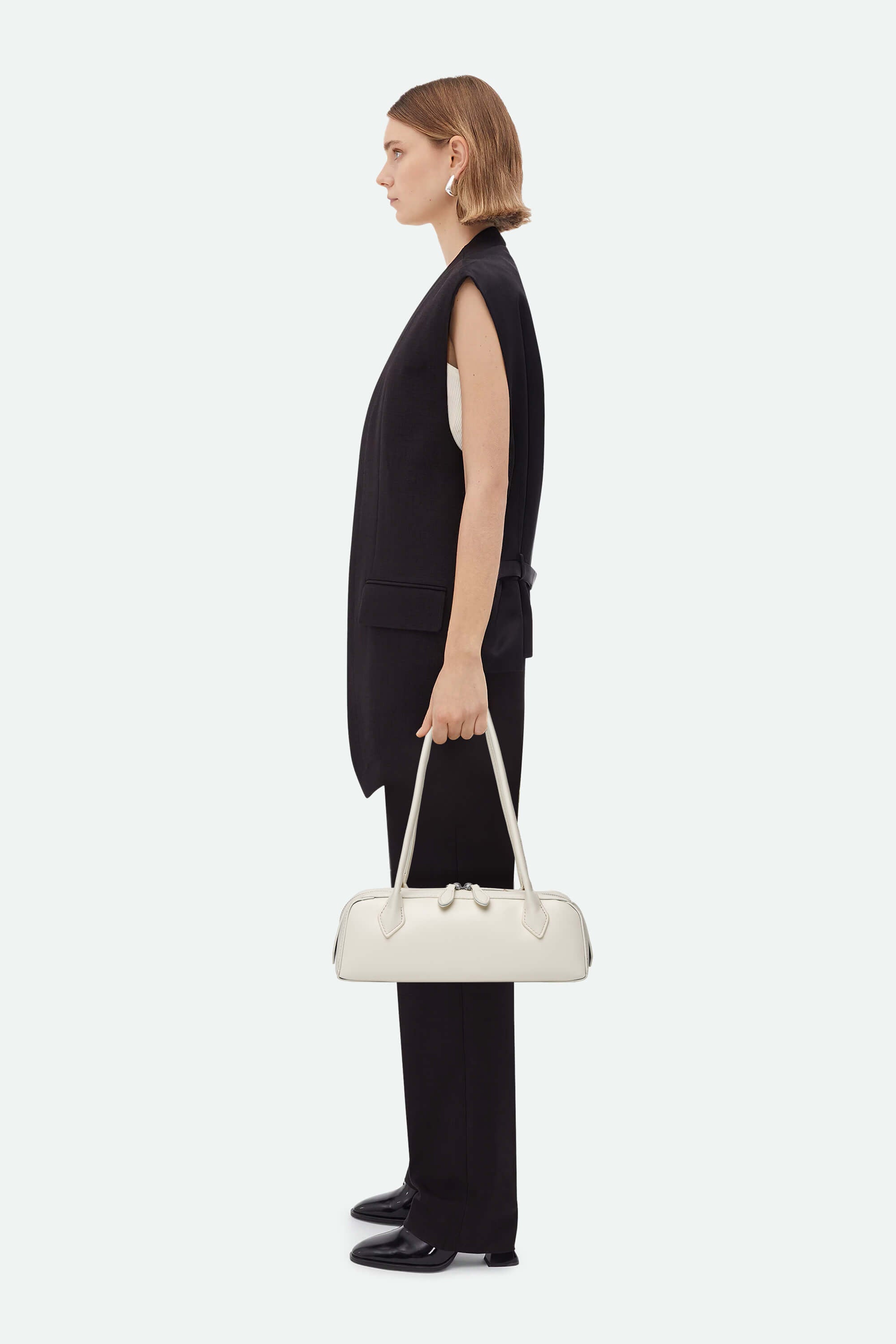 Medium Shoulder Bag (Alaïa Le Teckel) White On Model
