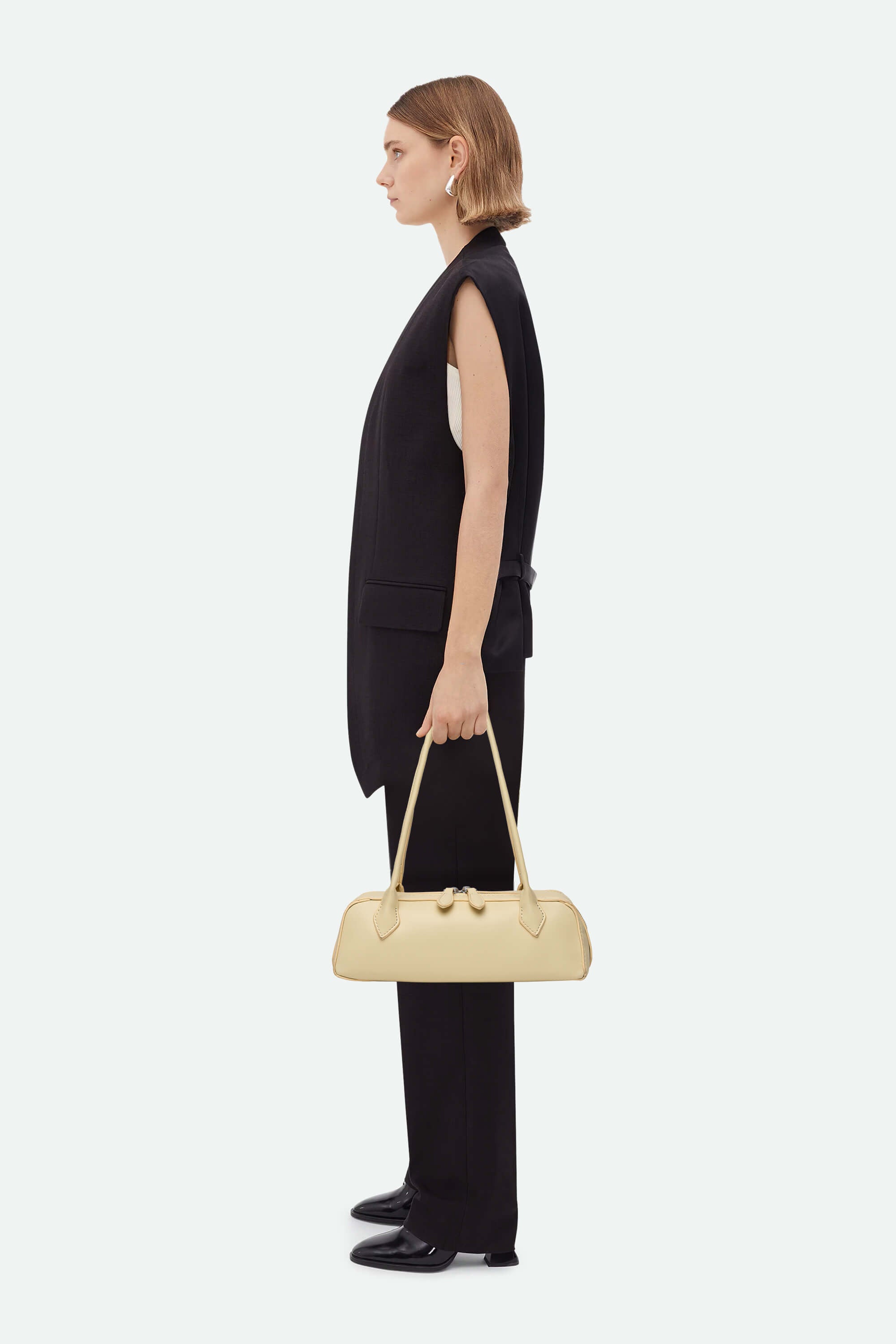 Medium Shoulder Bag (Alaïa Le Teckel) Yellow On Model