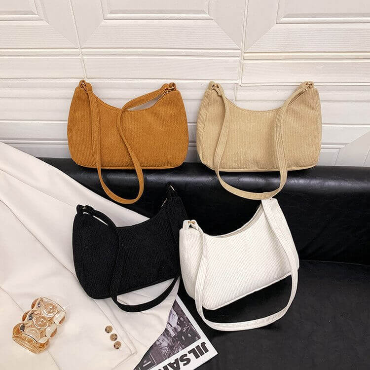 Multiple corduroy handbags with shoulder straps