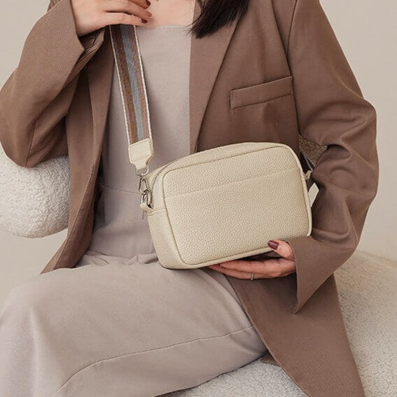 Woman wearing a Wide Strap Crossbody Bag