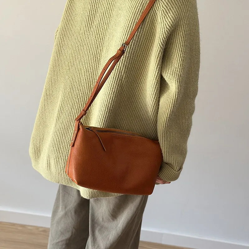 Valentina Seta crossbody bag in Terracotta, side view
