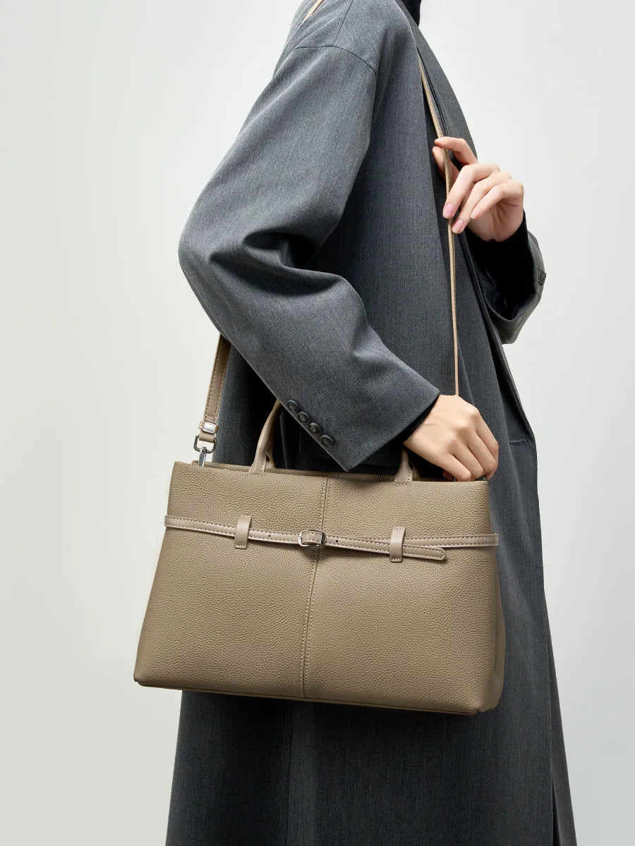 Valentina Pietra crossbody bag in Grey, worn