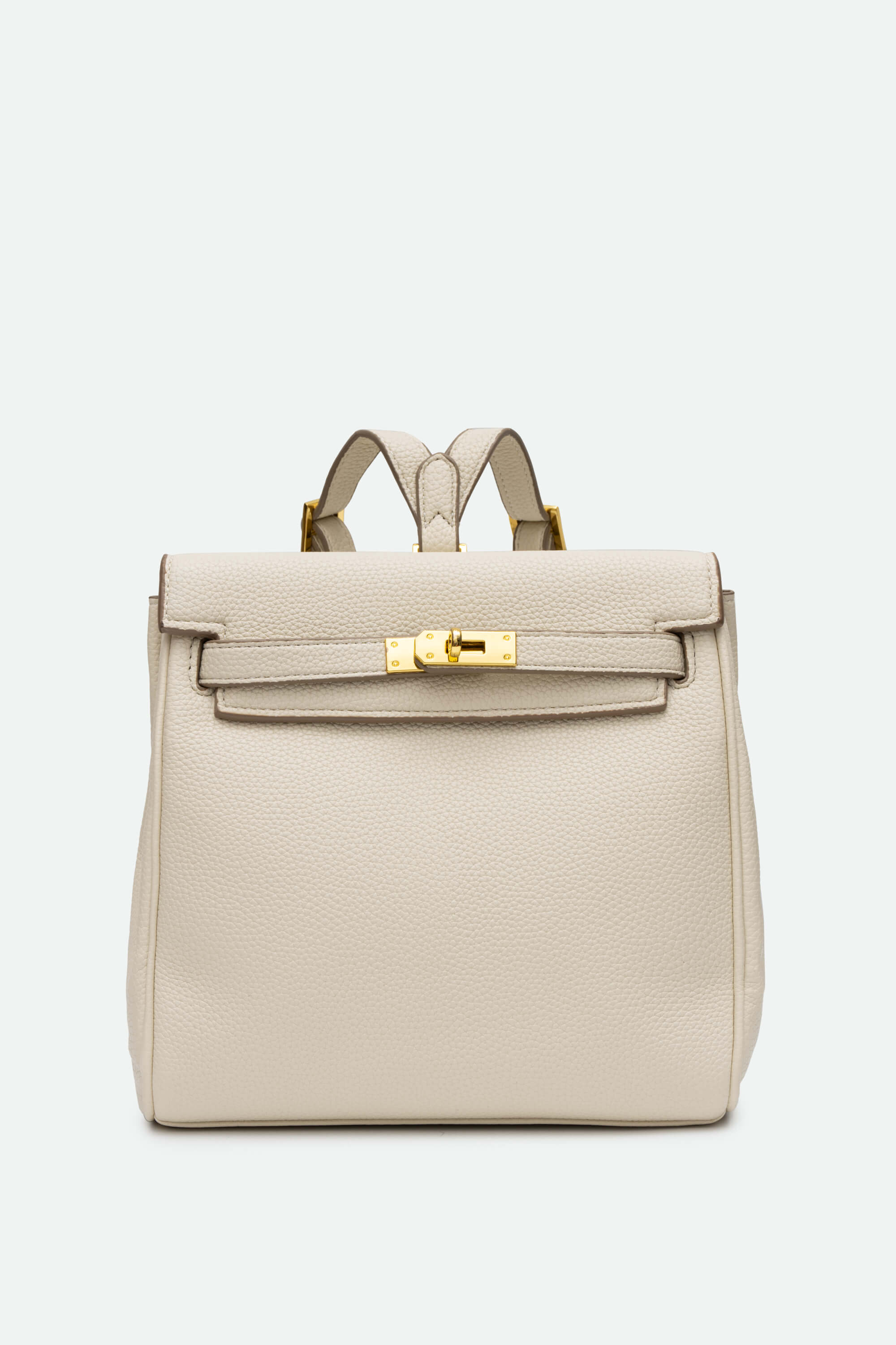 Beige backpack with gold hardware on a white background