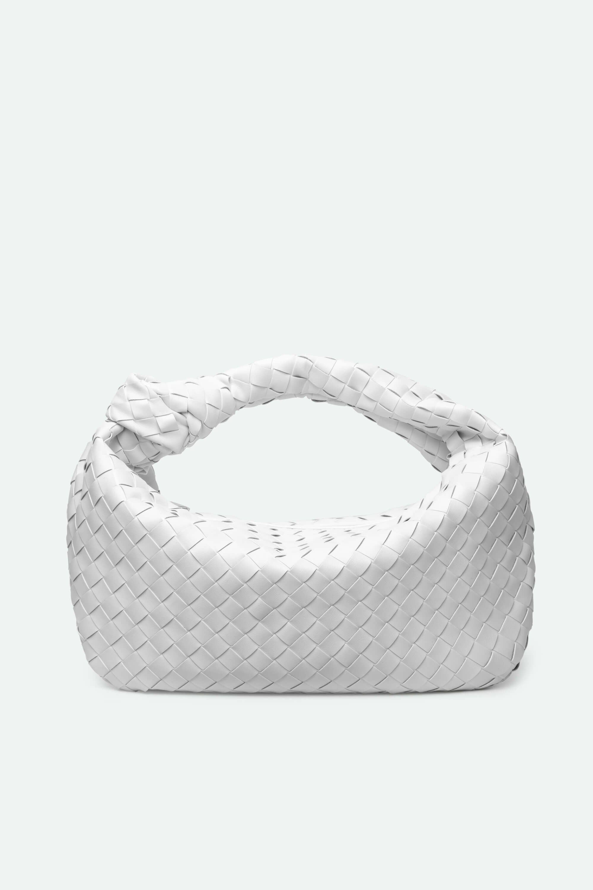 White woven basket on a white background