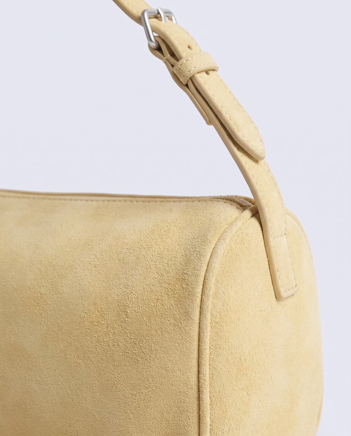 Alba barrel shoulder bag in Butter suede – close-up of the suede texture