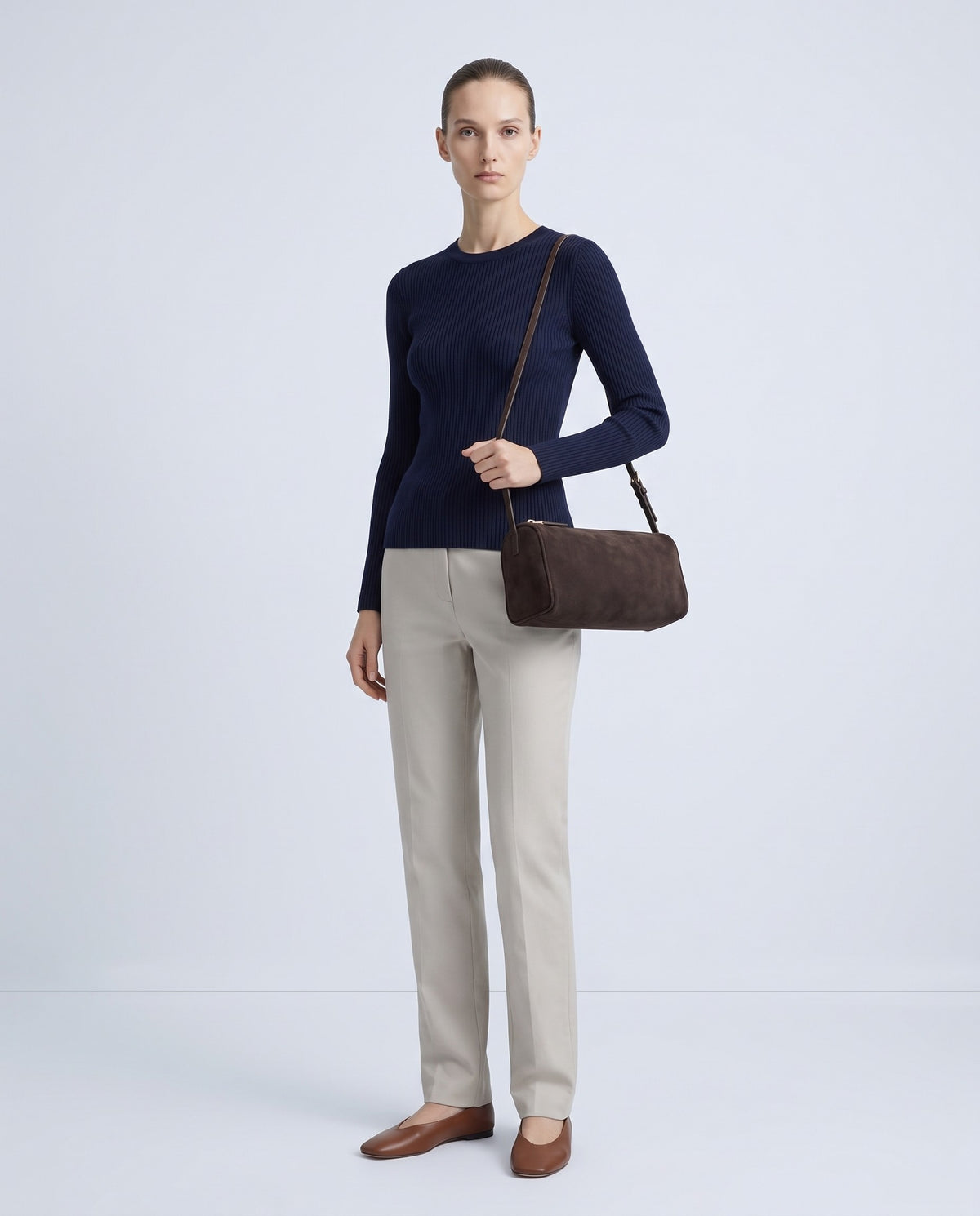 Model wearing the Alba barrel shoulder bag in Espresso suede – full length