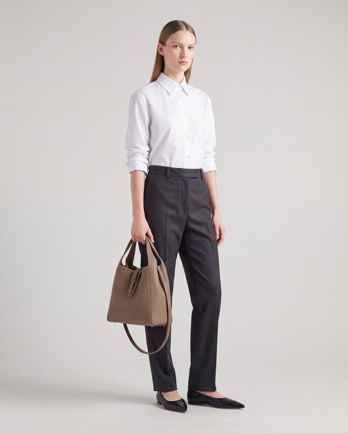 Amalfi bag in Taupe – worn by model, full length