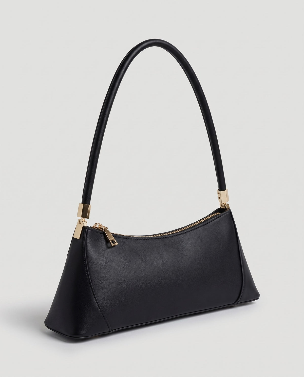 Arc leather shoulder bag in Black – three-quarter view