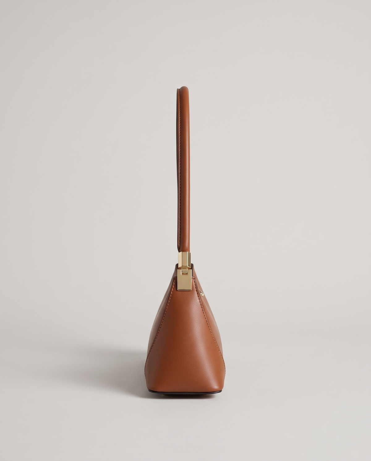 Arc leather shoulder bag in Brown – side view