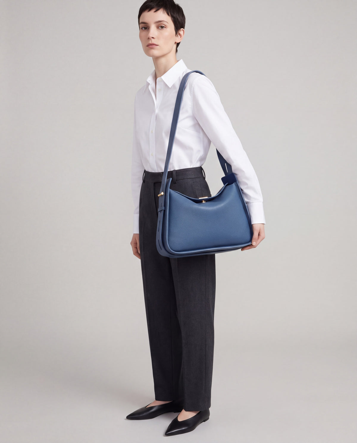 Asti bag in Blue – worn by model, close-up