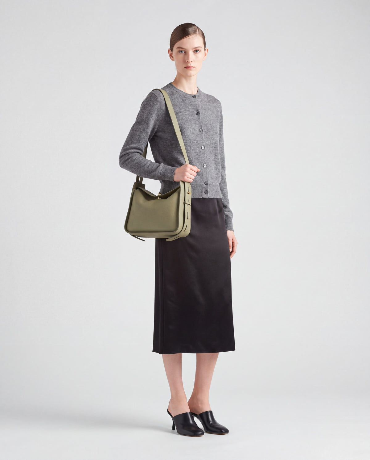 Asti bag in Sage – worn by model, full length