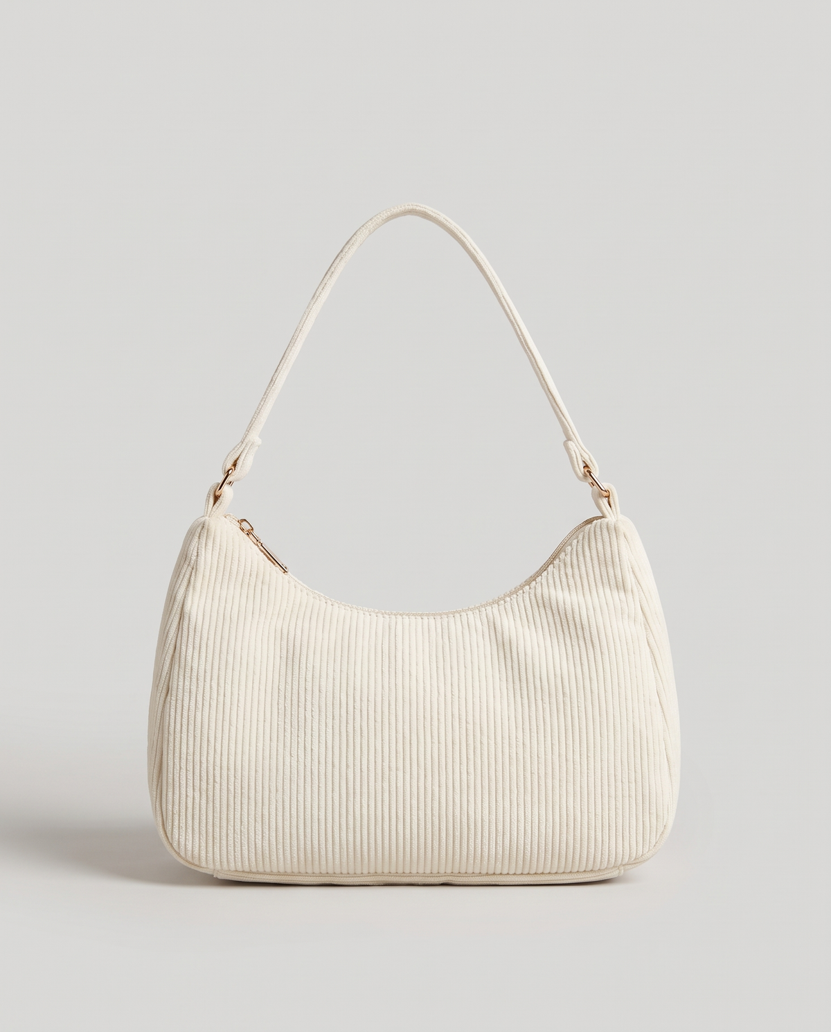 Aura corduroy shoulder bag in White – front view