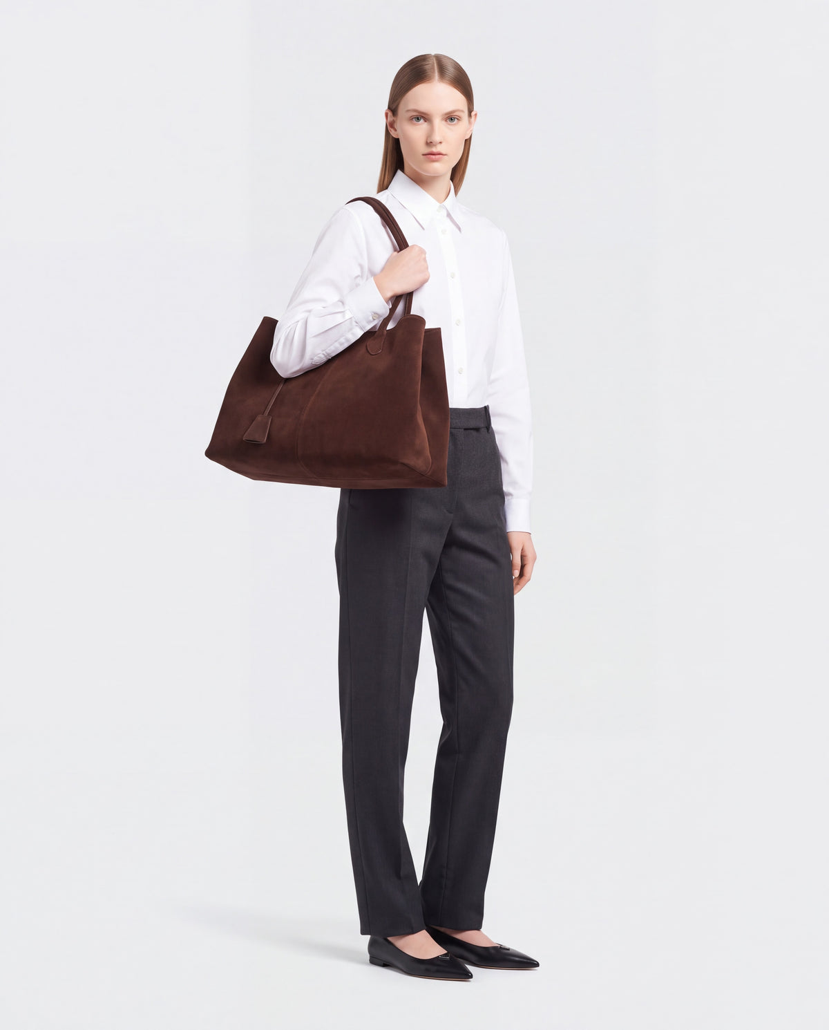 Bello bag in Chocolate – worn by model, full length