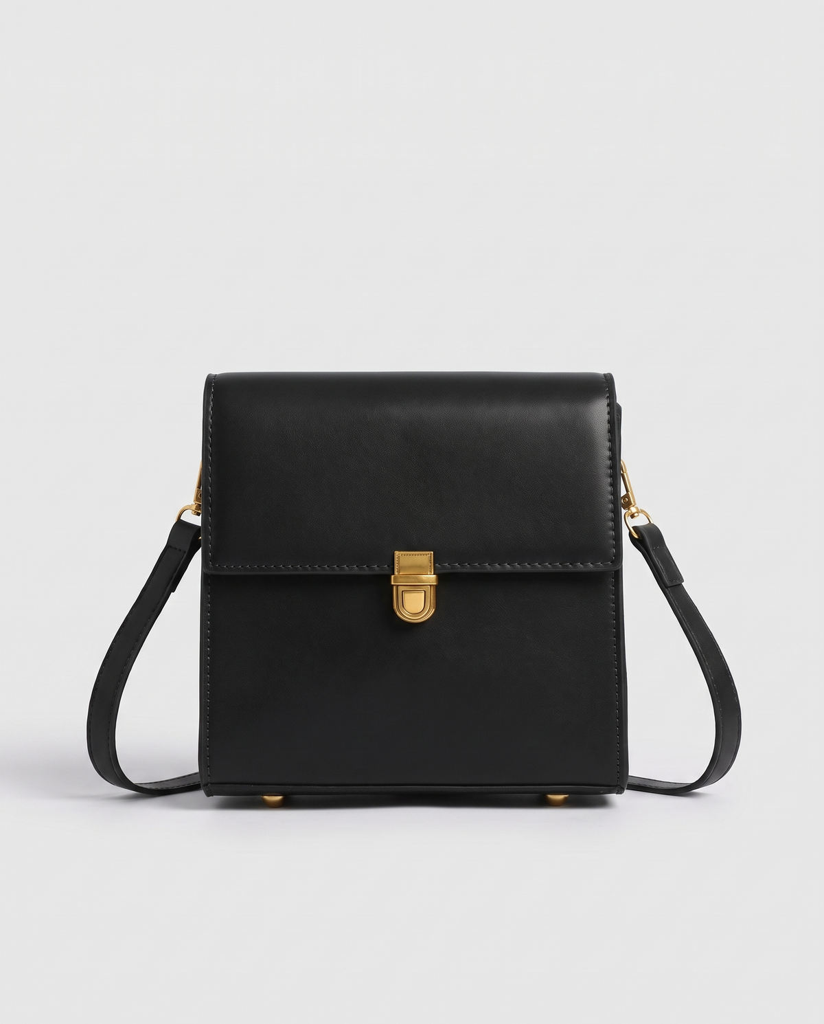 Bloc square vegan leather crossbody bag in Black – front view