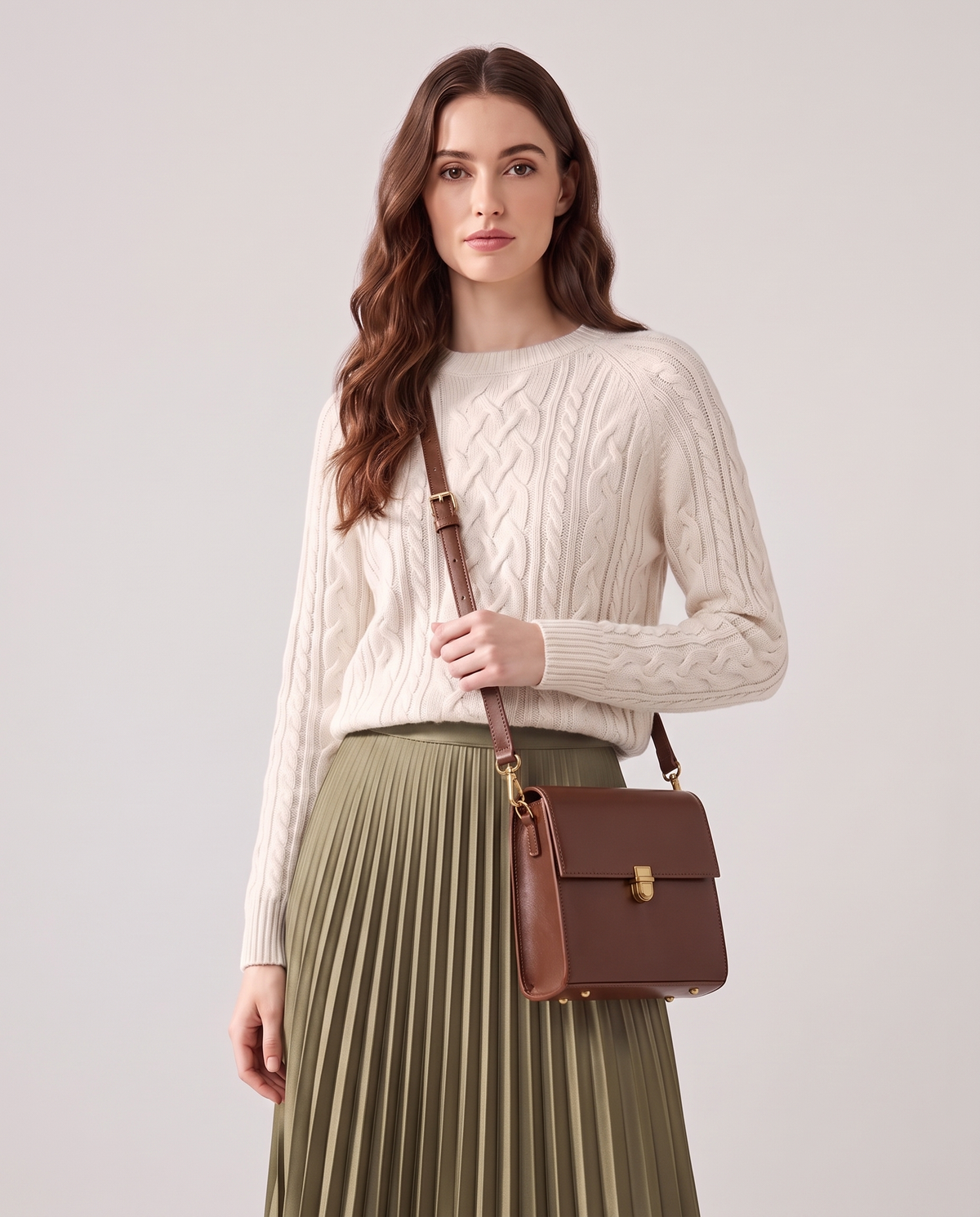 Bloc square vegan leather crossbody bag in Brown – model wearing it crossbody, waist-up
