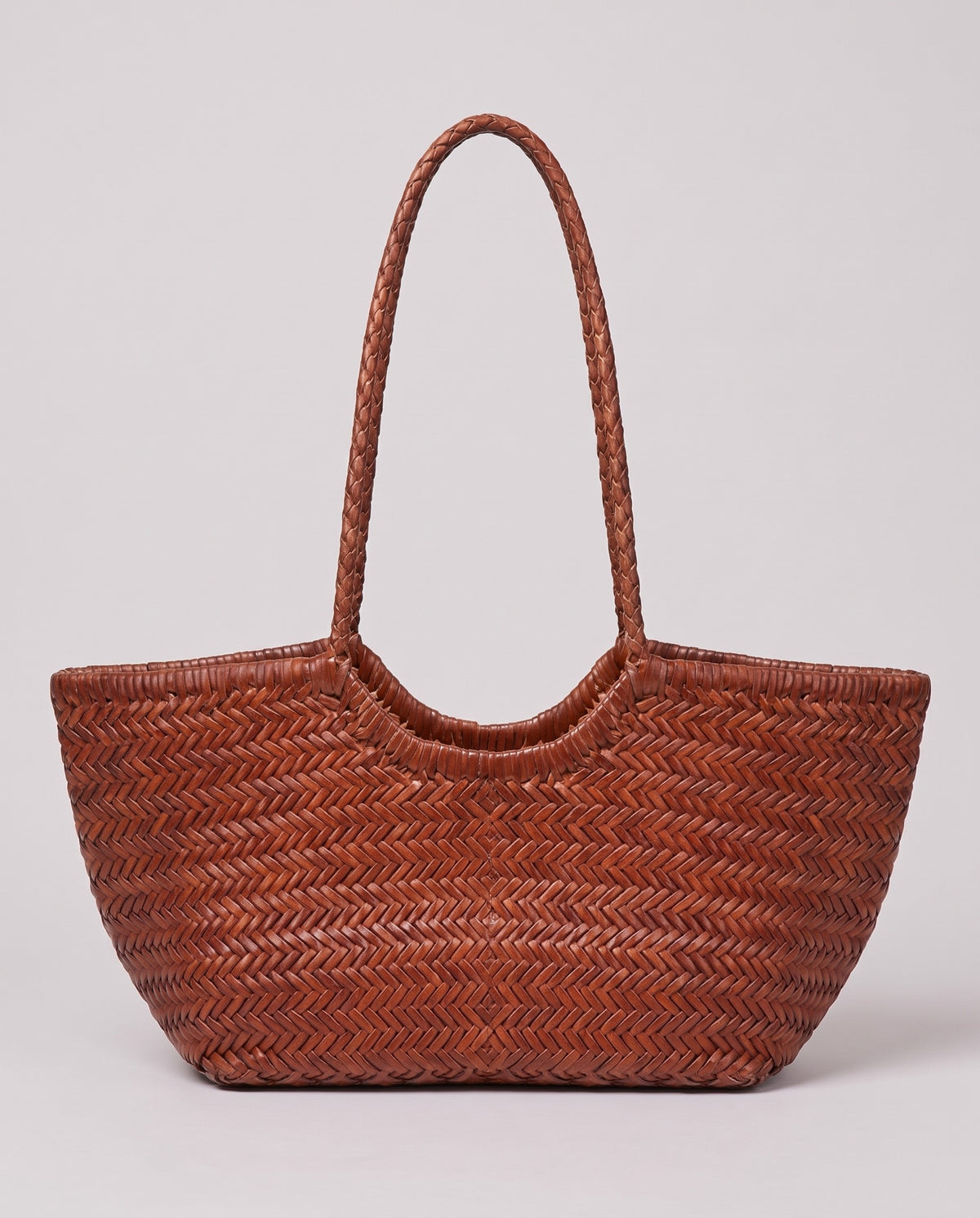 Hardware and handle detail on the Valentina Bosa bag in Cognac