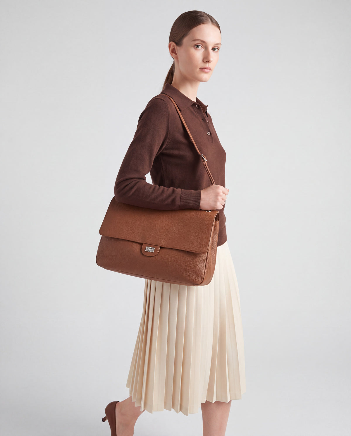 Brio Small bag in Brown – worn by model, close-up