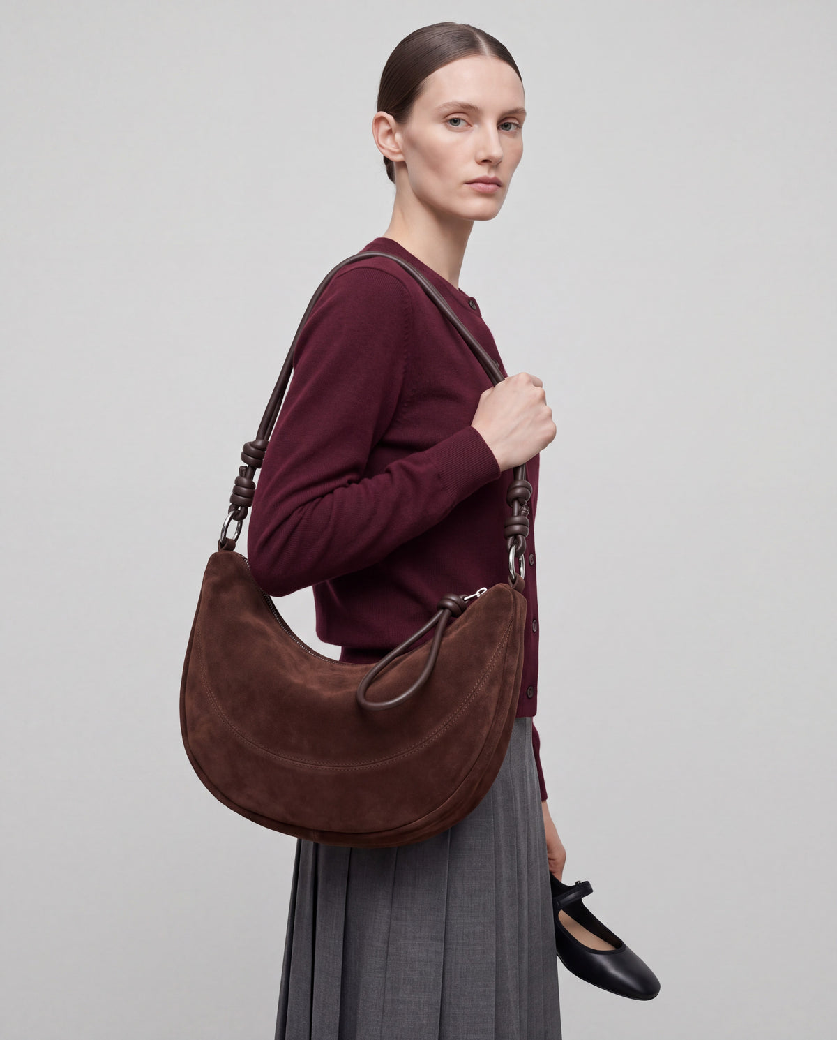 Bruma bag in Brown – worn by model, close-up