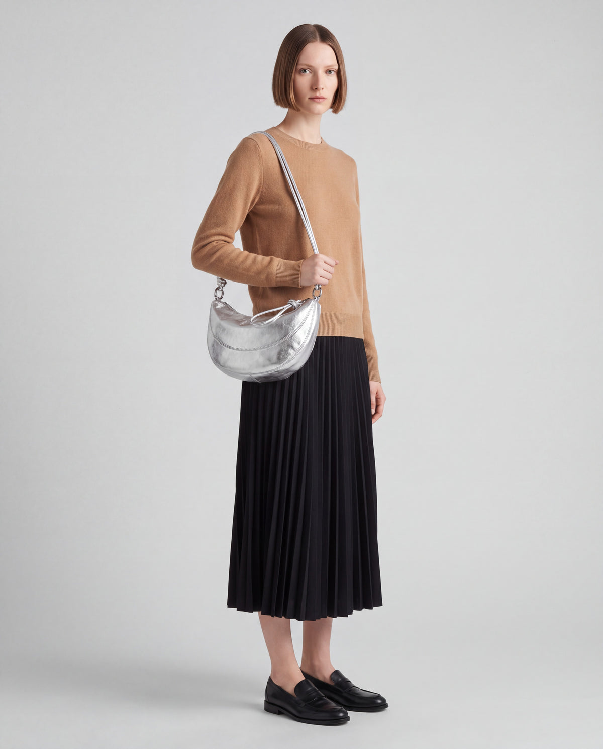 Bruma bag in Silver – worn by model, full length