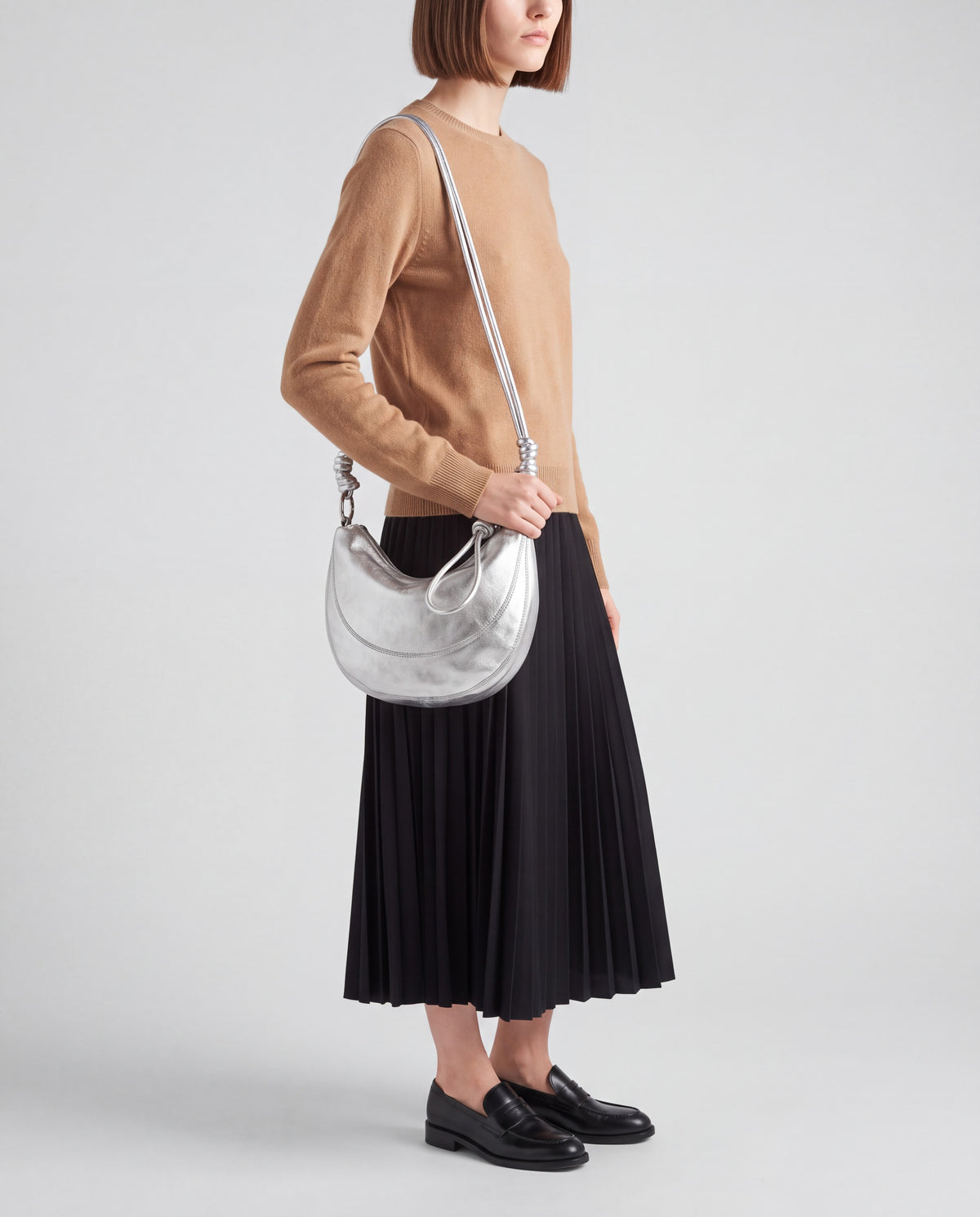 Bruma bag in Silver – worn by model, close-up