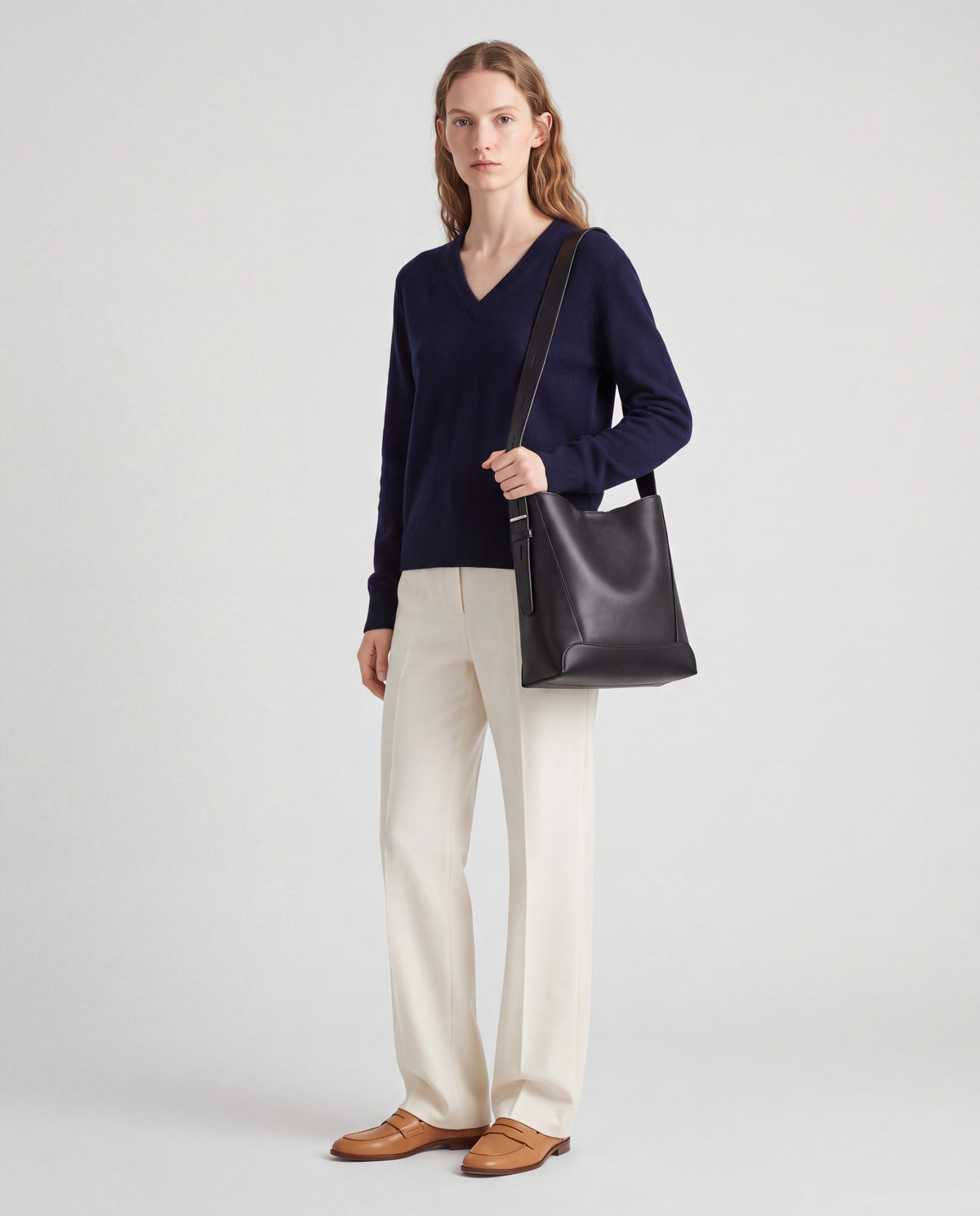 Calce bag in Black – worn by model, full length