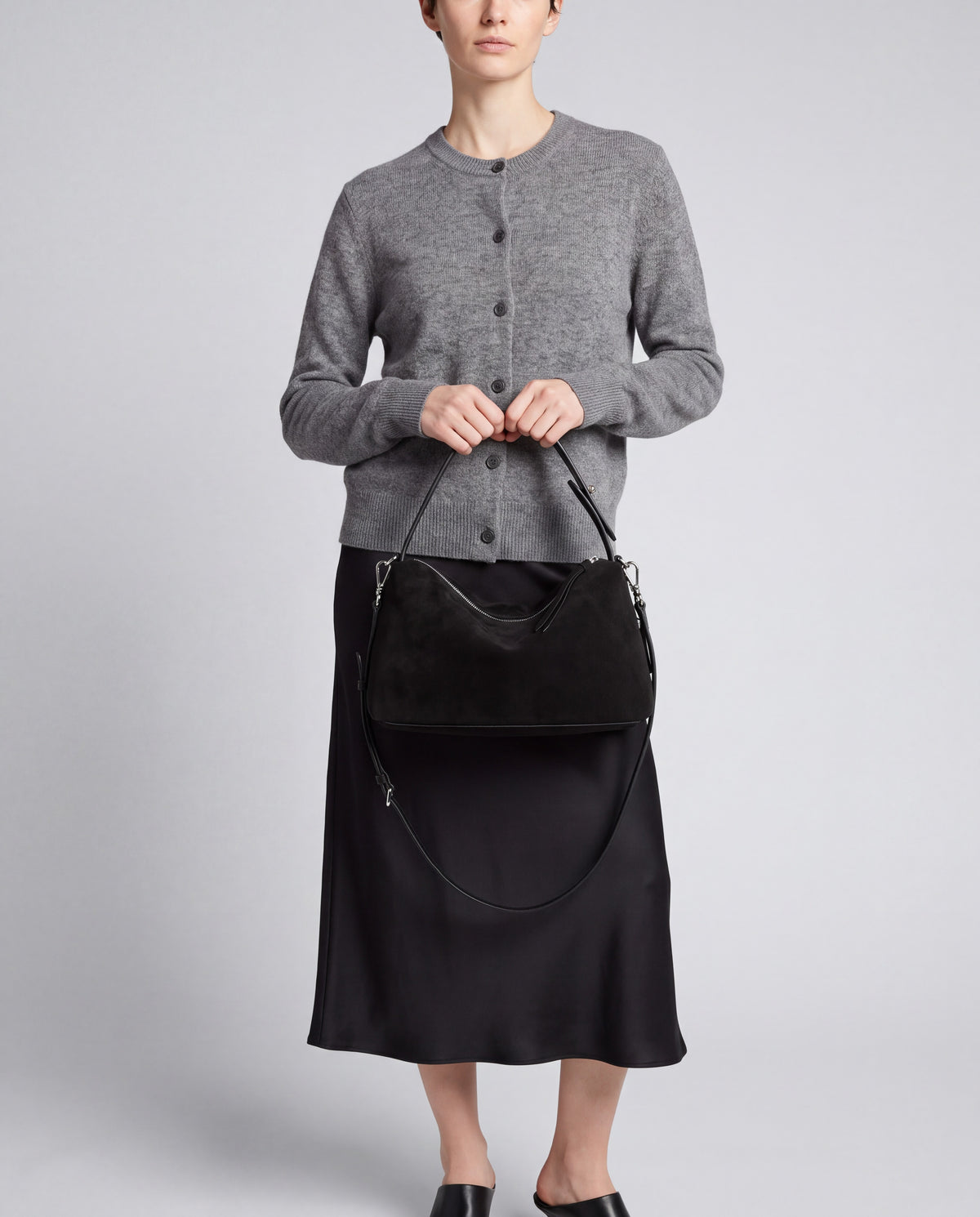 Calma bag in Black – worn by model, close-up