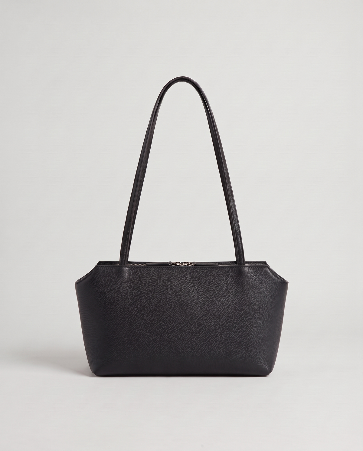 Capri leather shoulder bag in black, back view