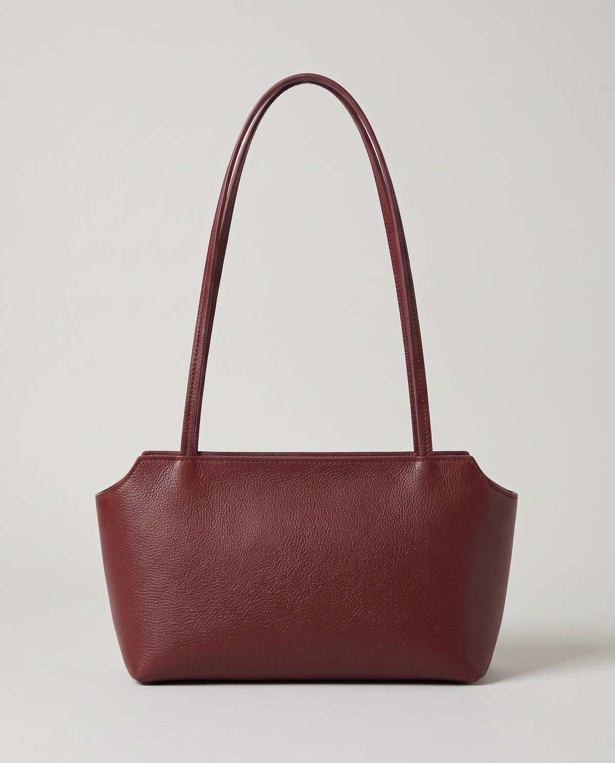 Capri leather shoulder bag in burgundy, front view