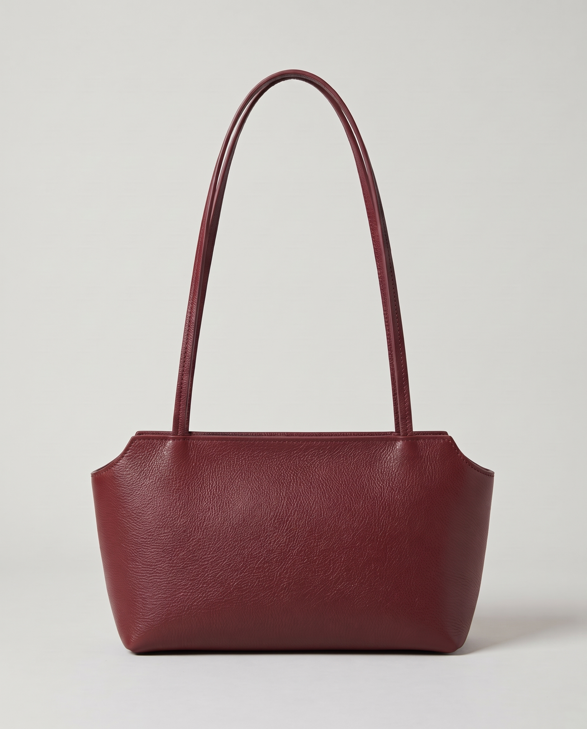 Capri leather shoulder bag in burgundy, back view