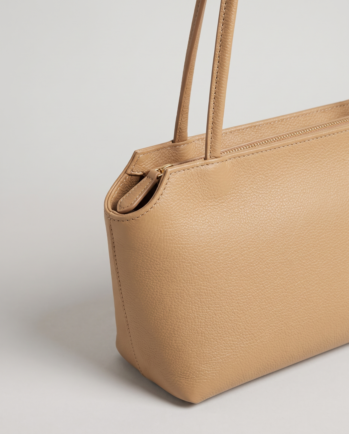 Capri leather shoulder bag in tan, hardware and leather detail