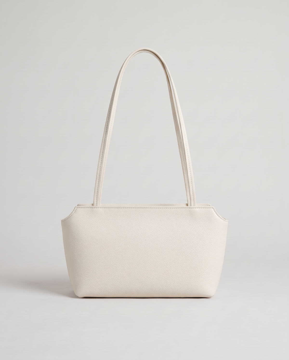 Capri leather shoulder bag in white, back view