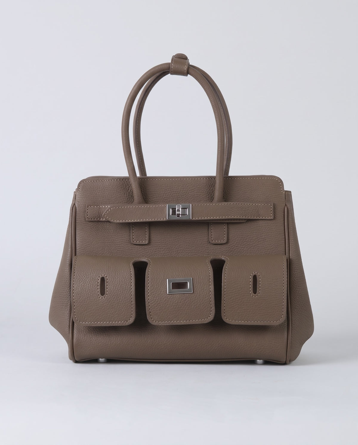 Capua leather tote with three front pockets in Mocha – front view