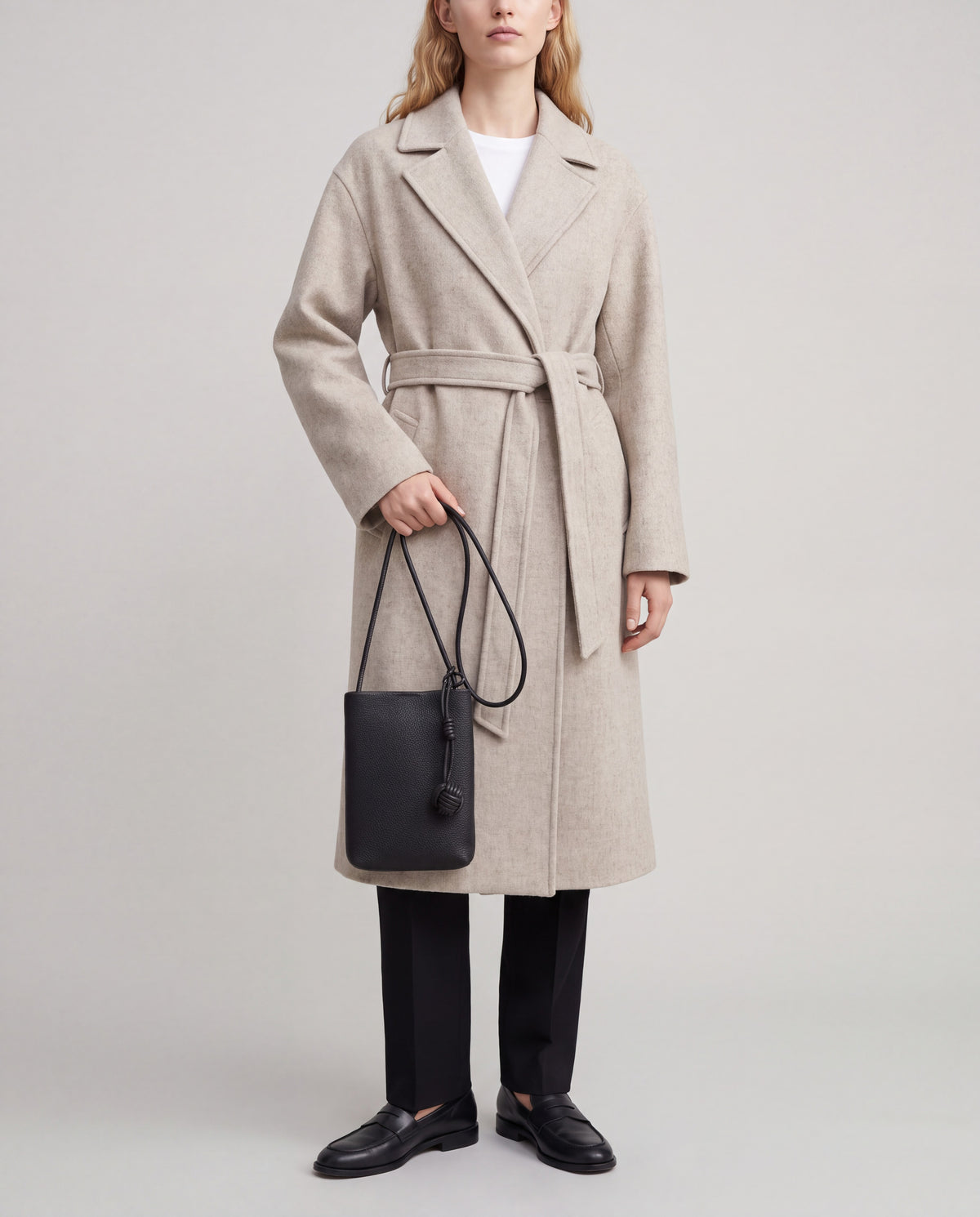 Cara bag in Black – worn by model, close-up