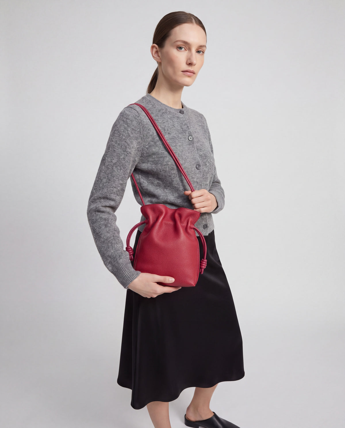 Cara bag in Cherry – worn by model, close-up