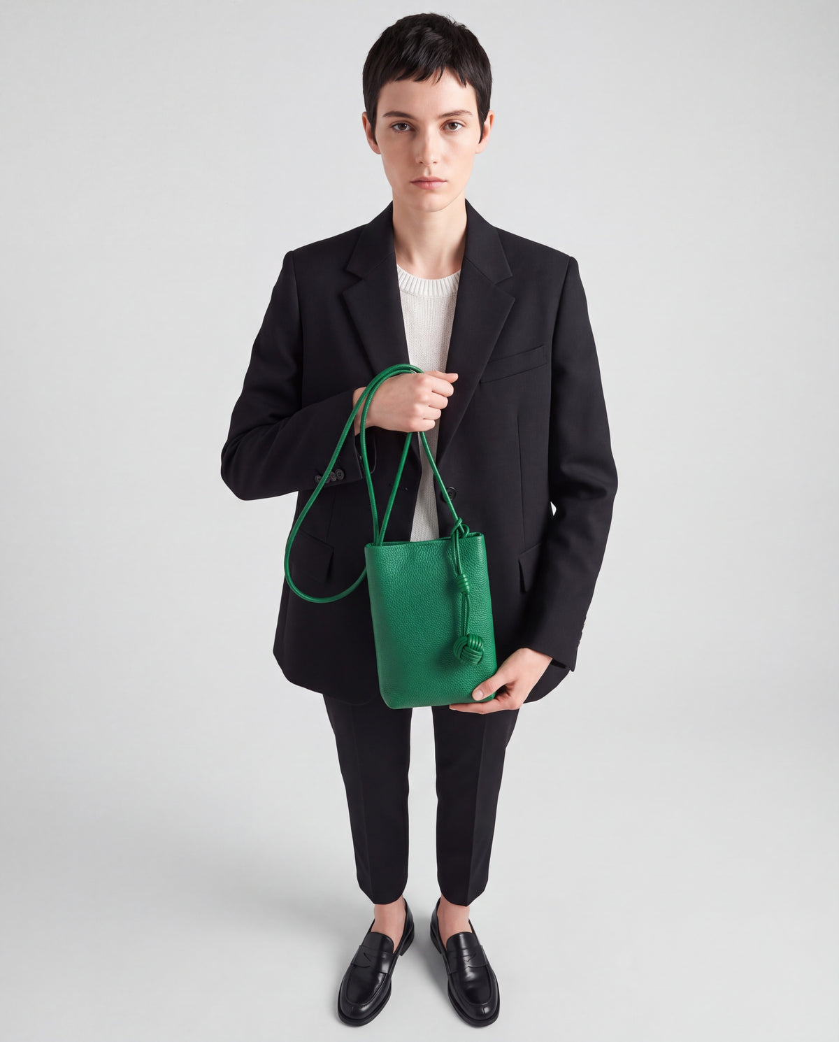 Cara bag in Emerald – worn by model, close-up