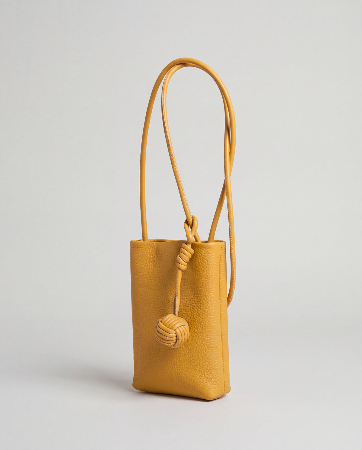 Cara bag in Mustard – three-quarter view