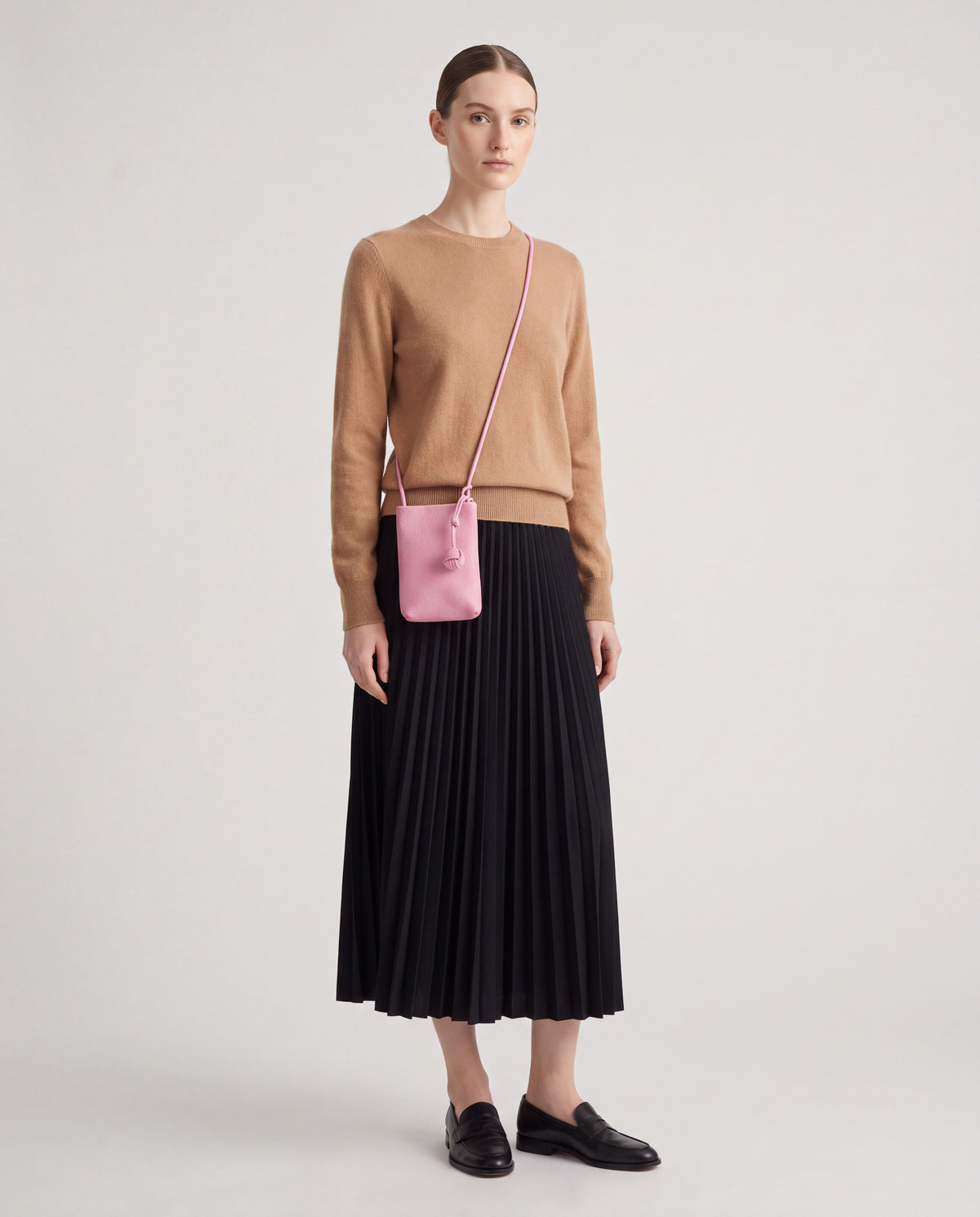 Cara bag in Pink – worn by model, full length