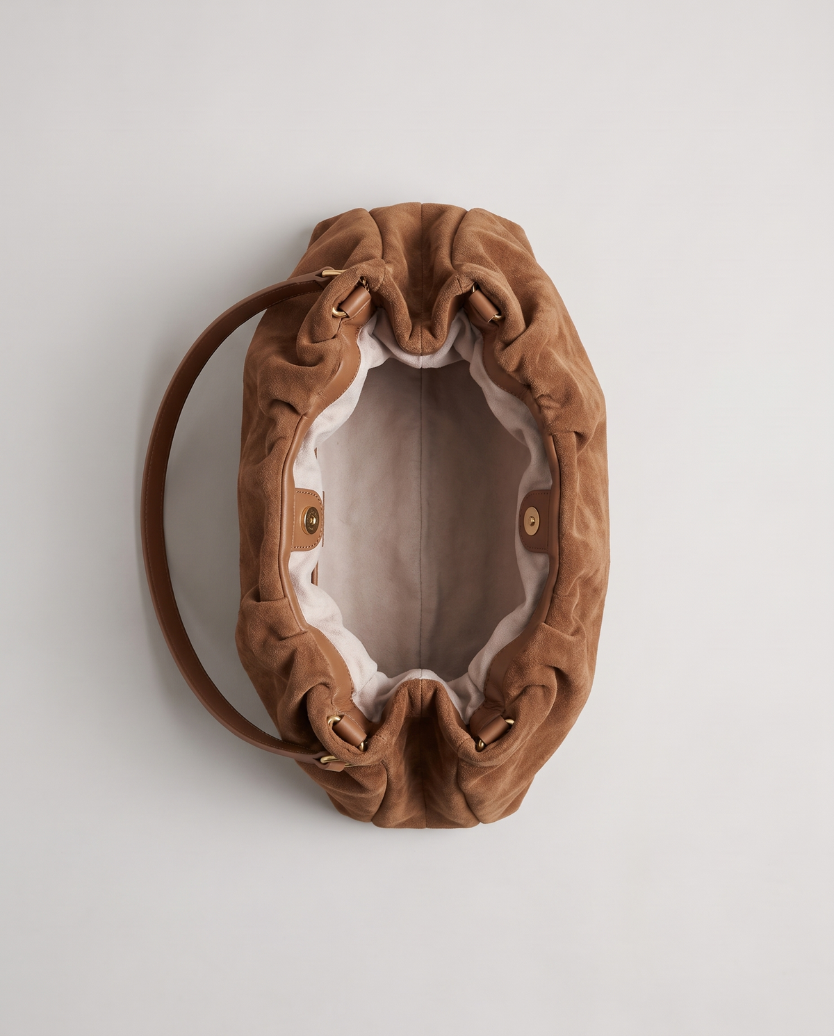 Cielo gathered suede bag in camel, open showing interior