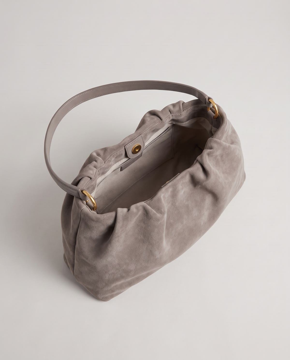 Cielo gathered suede bag in taupe, open showing interior